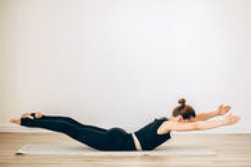 woman practice pilates at yoga gym